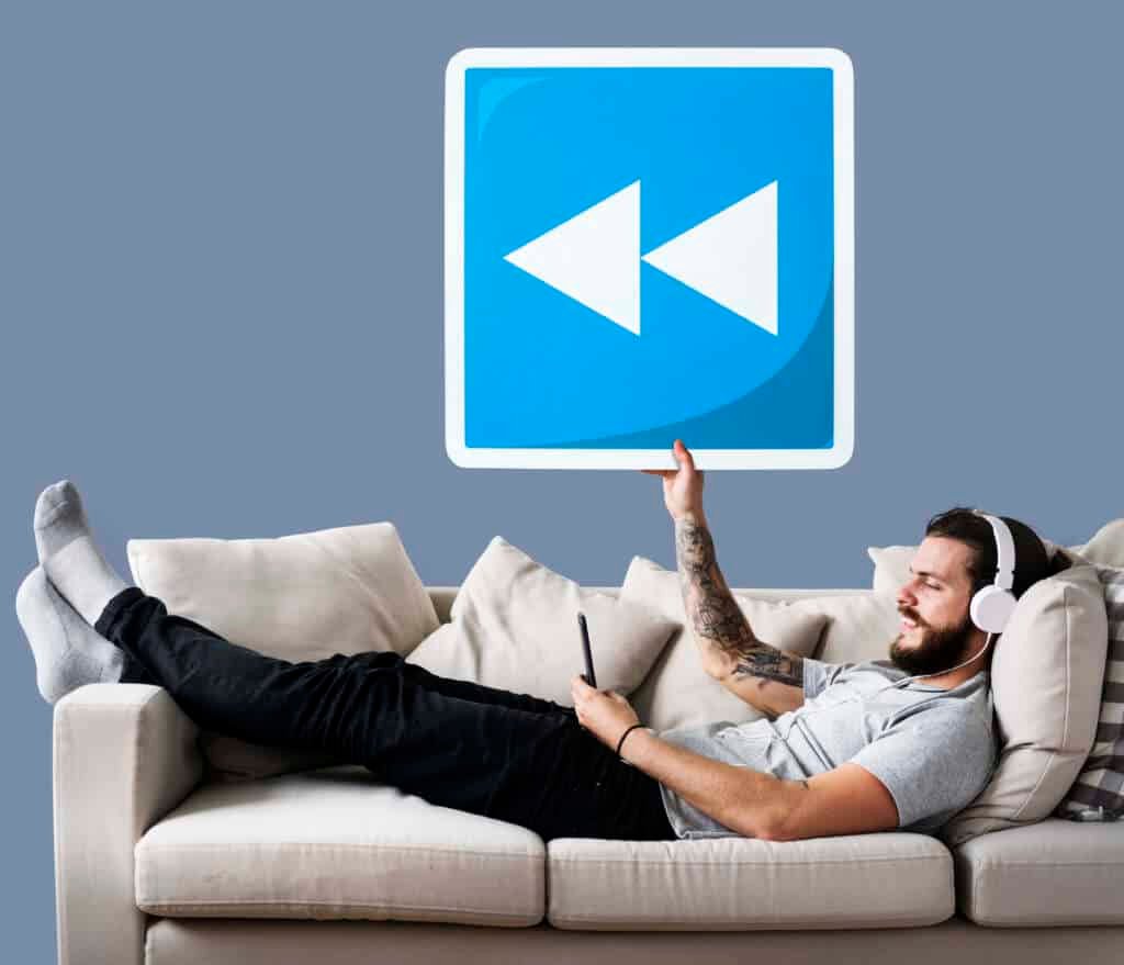 male-couch-holding-rewind-button-icon Top Features of 2025 Viking IPTV You Should Know
